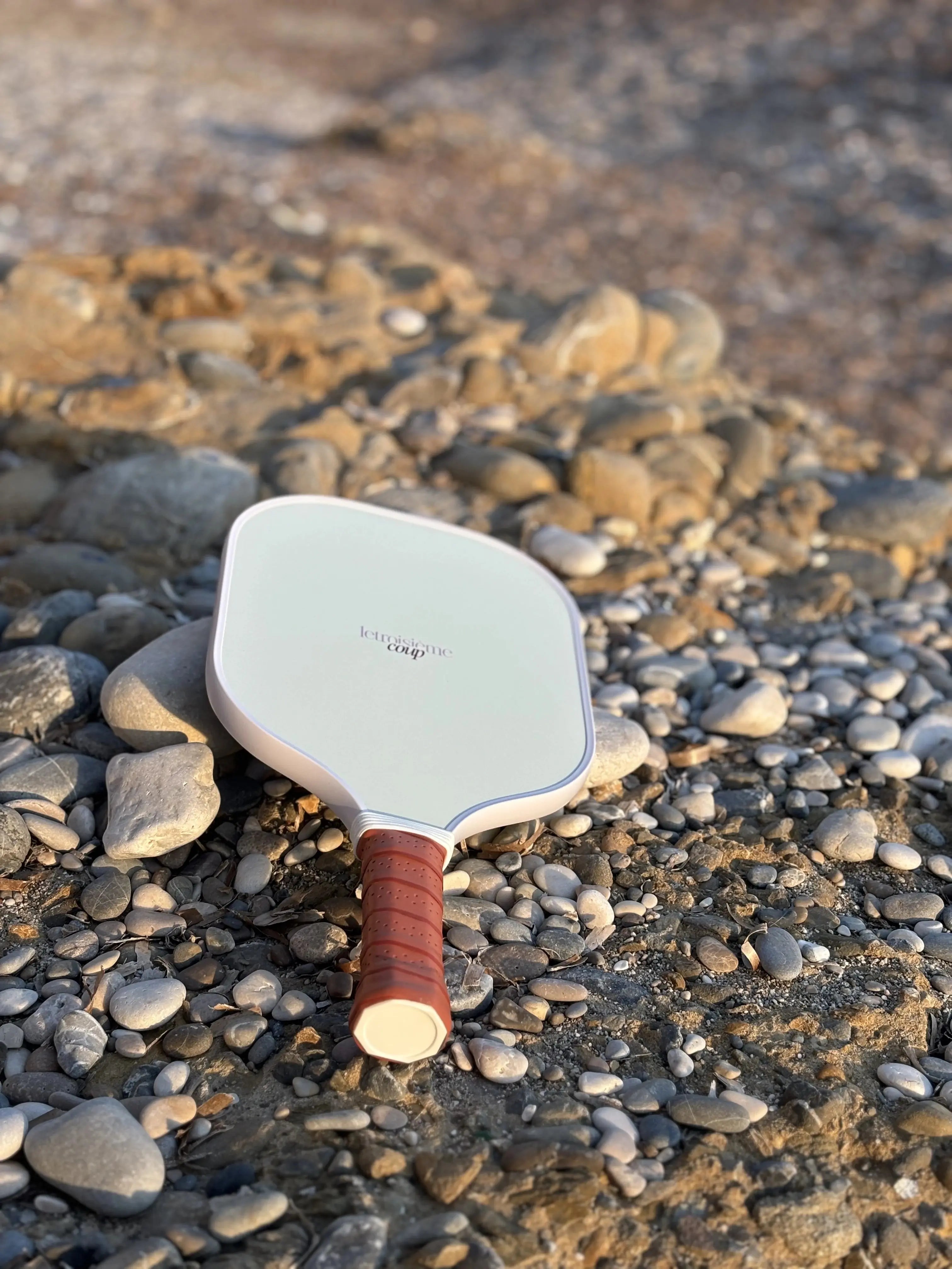 Raquette de pickleball plage